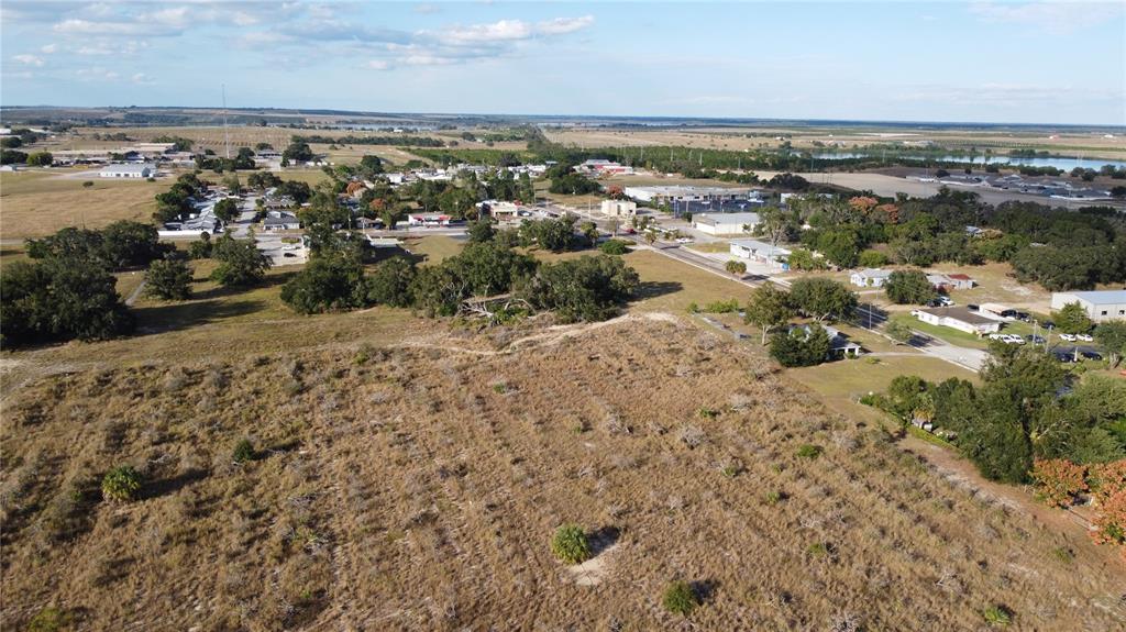 60 F Street West Frostproof, FL 33843 - Photo 6 of 8 an aerial view of a house with a lake view