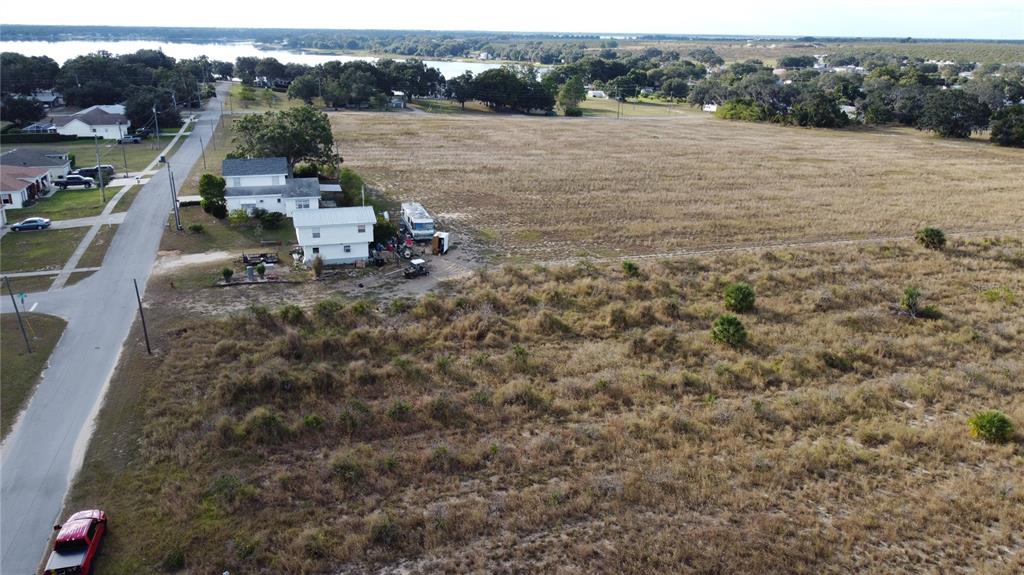 60 F Street West Frostproof, FL 33843 - Photo 8 of 8 a view of a lake with outdoor space