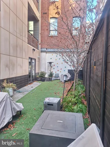 a view of a building with a swimming pool