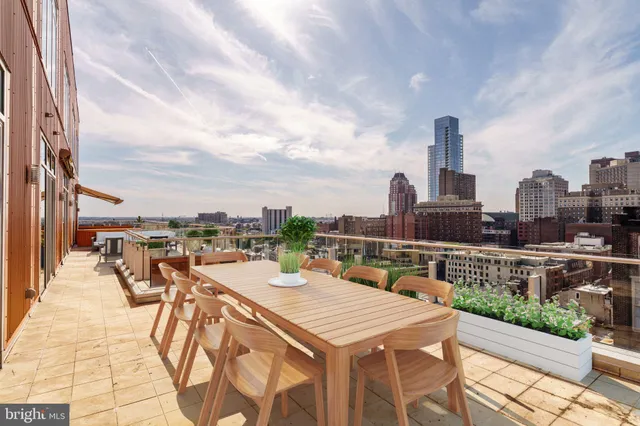 a view of a terrace with sitting area