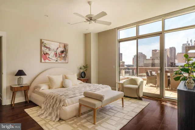 a kitchen with granite countertop a table and chairs