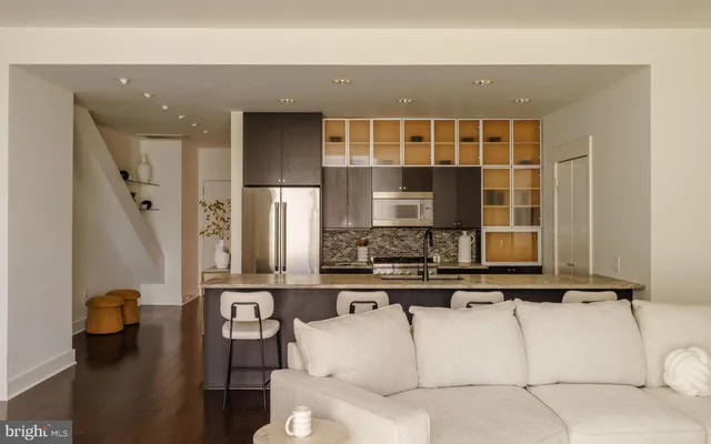 a front view of a building with glass windows