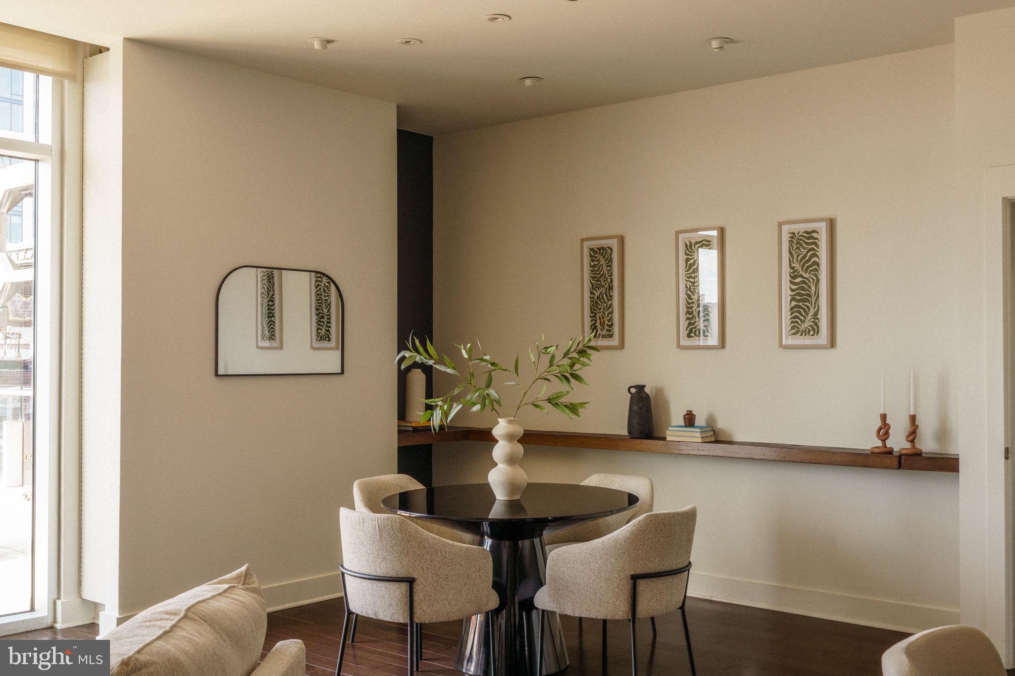 1111 Locust Street, Unit PH10D Philadelphia, PA 19107 - Photo 31 of 31 a dining room with table and chairs
