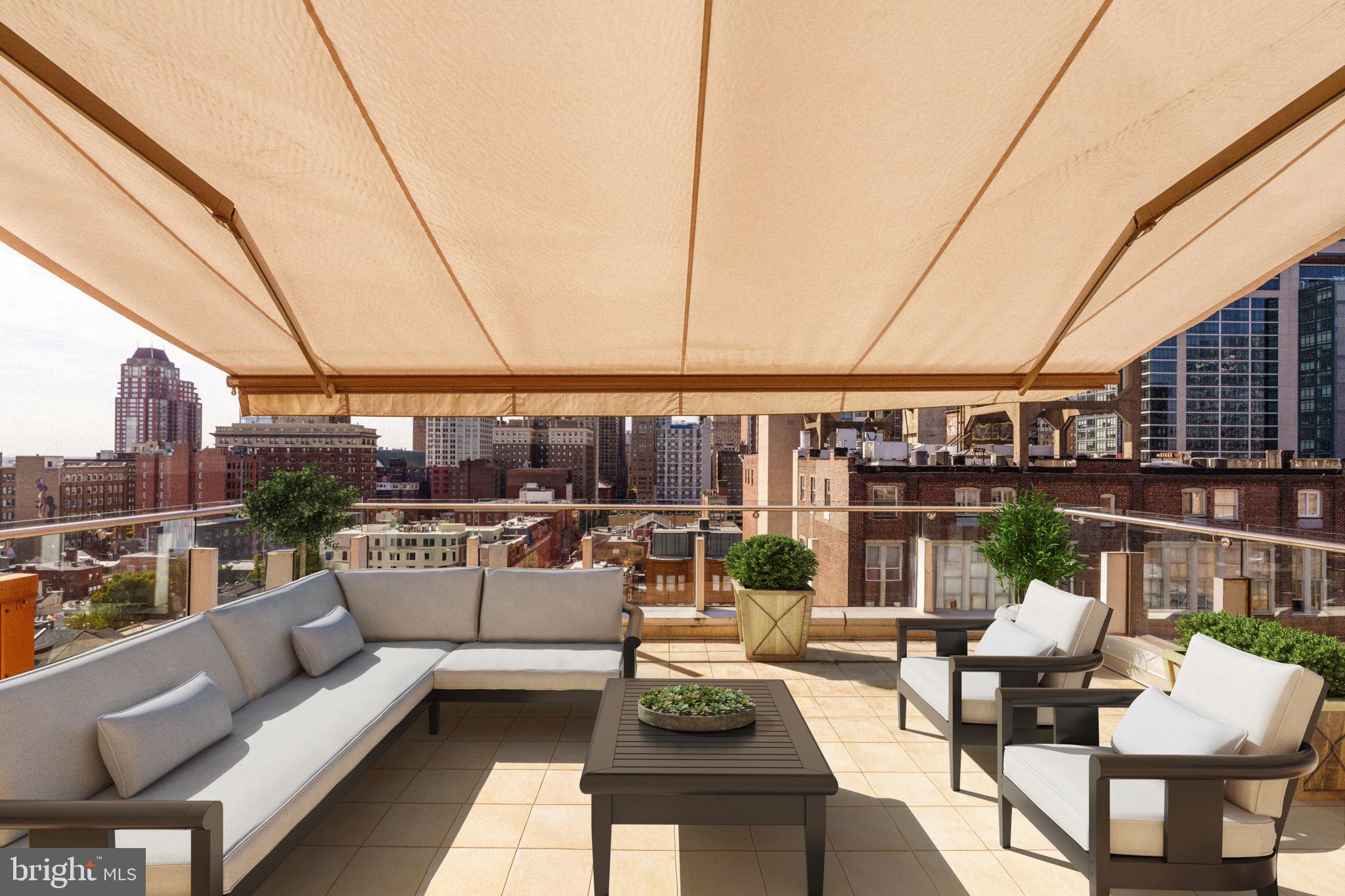 1111 Locust Street, Unit PH10D Philadelphia, PA 19107 - Photo 2 of 31 a view of a roof deck with couches and potted plants