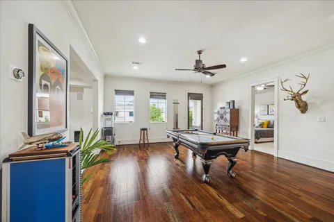 a workspace with furniture and wooden floor