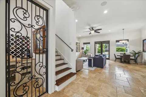 a view of entryway wih livingroom and stairs