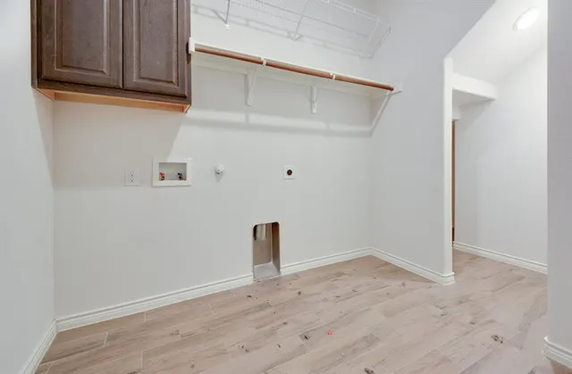 a view of small space with wooden floor