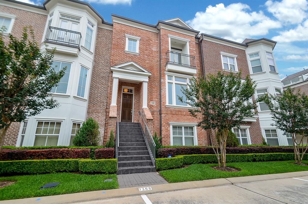 Gorgeous 4-Story Townhome in the heart of Sugar Land!  Located in a Gated Community with a Lake near by!