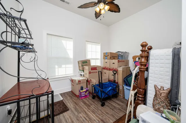 a view of a livingroom with furniture