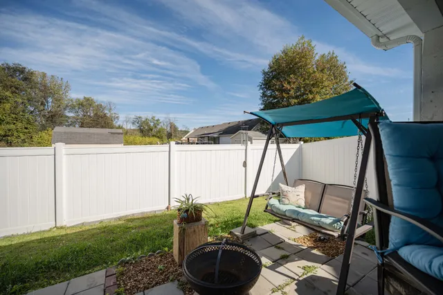 a room with furniture or couch and a window