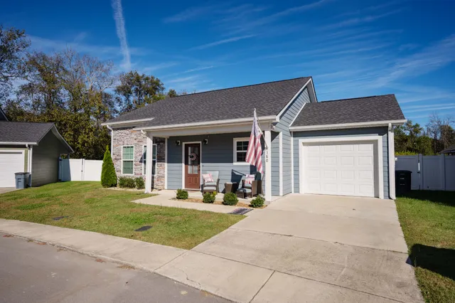 front view of a house with a yard