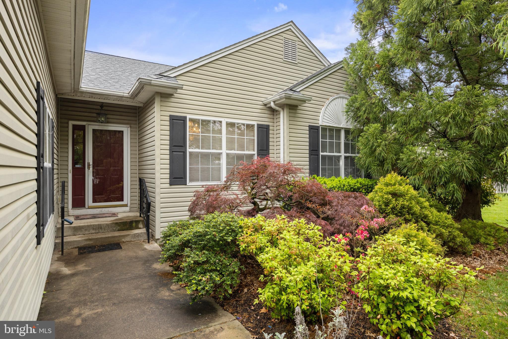 4 Tara Lane Delran, NJ 08075 - Photo 1 of 36 front view of a house with a yard