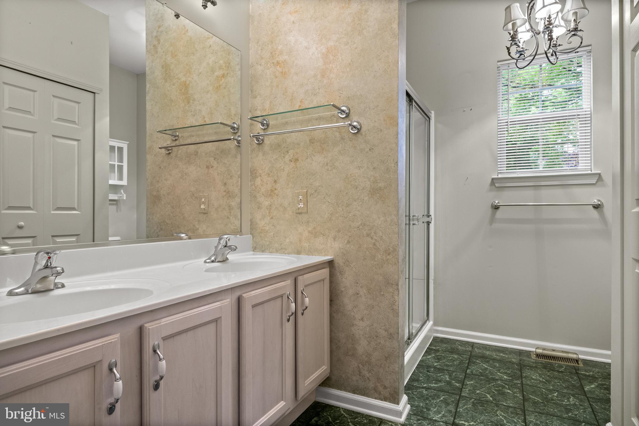 4 Tara Lane Delran, NJ 08075 - Photo 17 of 36 a bathroom with a sink and a mirror