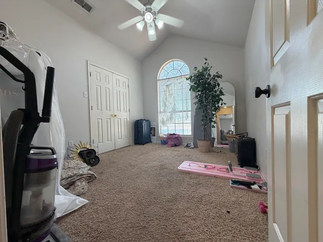 a view of a backyard of a house