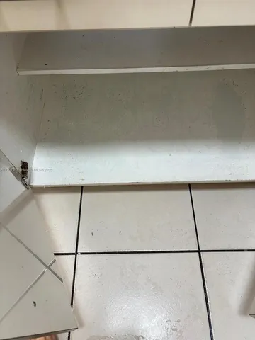 a kitchen with stainless steel appliances granite countertop a sink a stove a microwave and cabinets