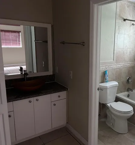 a bathroom with a sink and a toilet