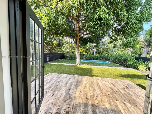 a view of swimming pool with garden