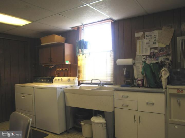 320 Gribbel Road Wyncote, PA 19095 - Photo 11 of 24 a utility room with closet and mirror