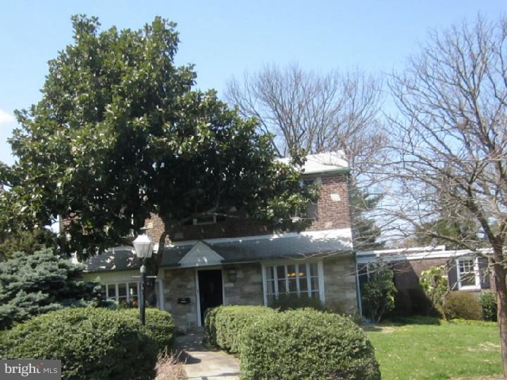 320 Gribbel Road Wyncote, PA 19095 - Photo 24 of 24 front view of a house with a garden