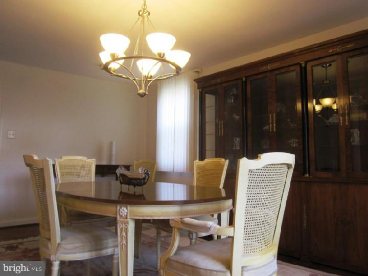 320 Gribbel Road Wyncote, PA 19095 - Photo 6 of 24 a dining room with furniture and chandelier