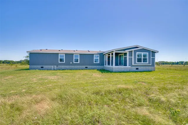 a view of a house with a swimming pool