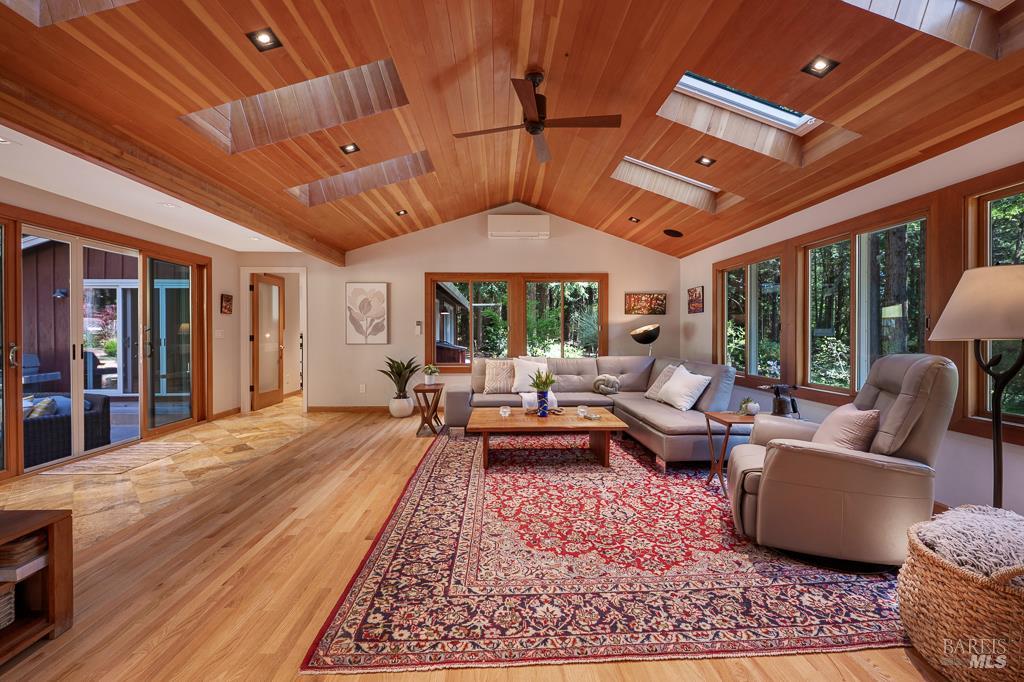 17600 Willow Creek Road Occidental, CA 95465 - Photo 12 of 79 Huge living room with stunning wood ceilings and slider to the poolside patio.
