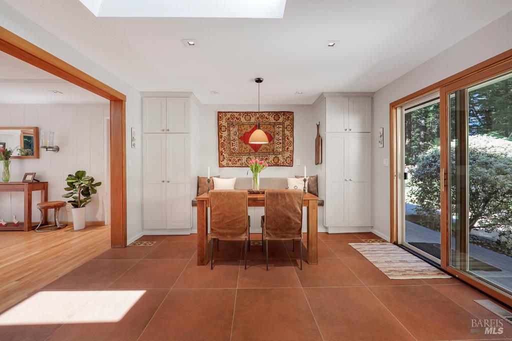 17600 Willow Creek Road Occidental, CA 95465 - Photo 20 of 79 Built-in pantry and storage on both sides of the breakfast table. Slider leads to the pool and gardens.