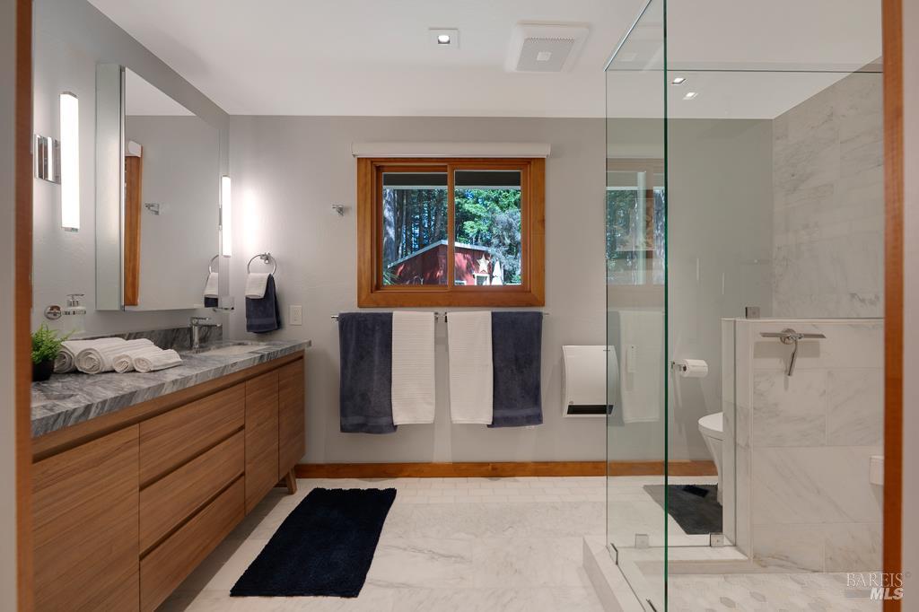 17600 Willow Creek Road Occidental, CA 95465 - Photo 35 of 79 Primary bathroom with double sinks, spacious walk-in shower. and heated floors.