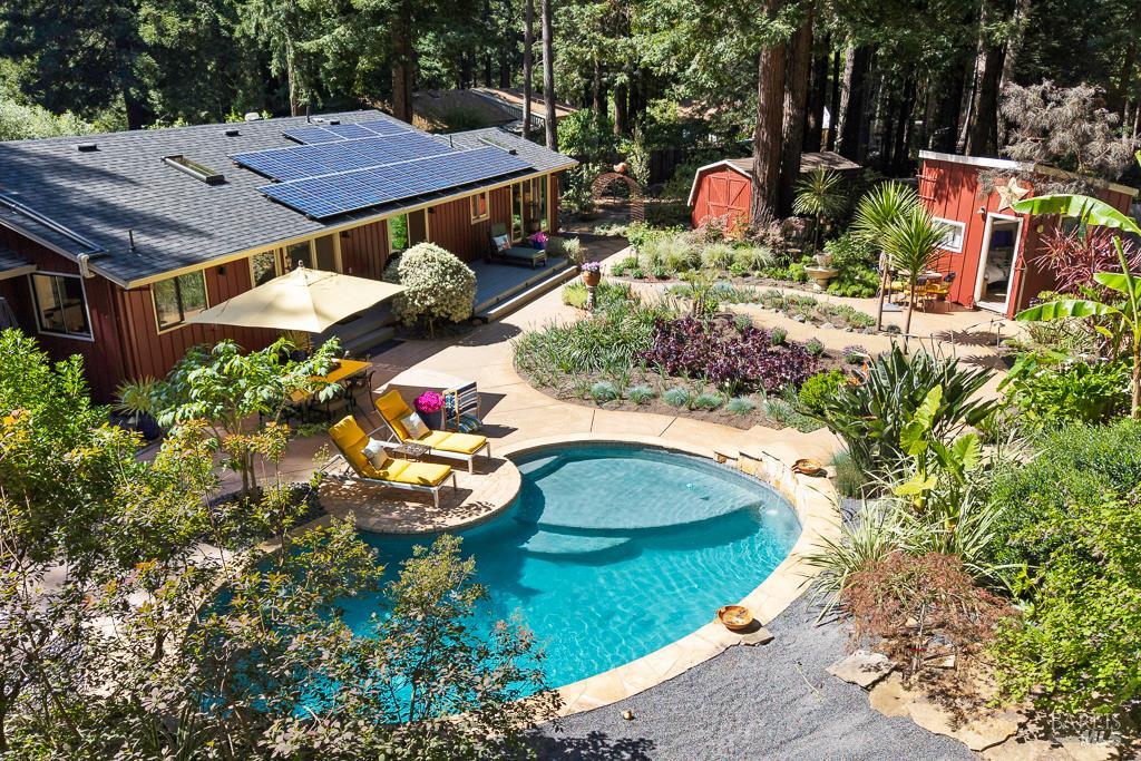 17600 Willow Creek Road Occidental, CA 95465 - Photo 42 of 79 Solar panels on both sides of the roof supply lots of power.