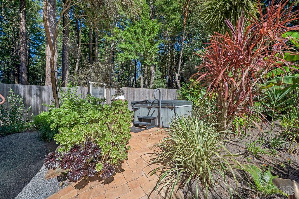 17600 Willow Creek Road Occidental, CA 95465 - Photo 51 of 79 The hot tub and outdoor shower ticked privately in the back, surrounded with lush plantings and fragrance that will entice any nature lover.