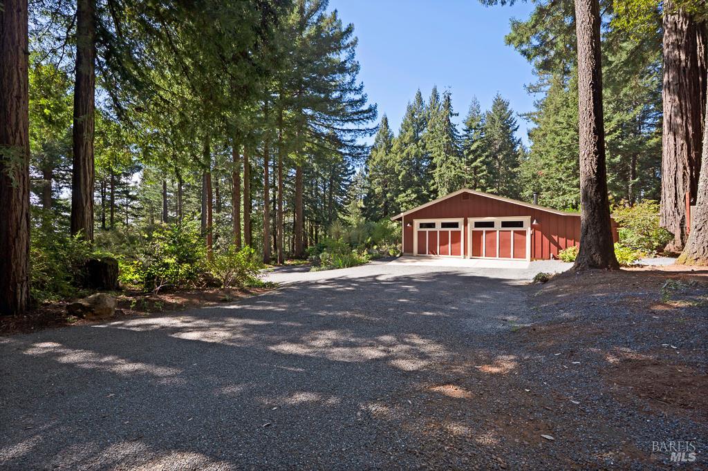 17600 Willow Creek Road Occidental, CA 95465 - Photo 6 of 79 Attached, oversized two car garage with workbench.