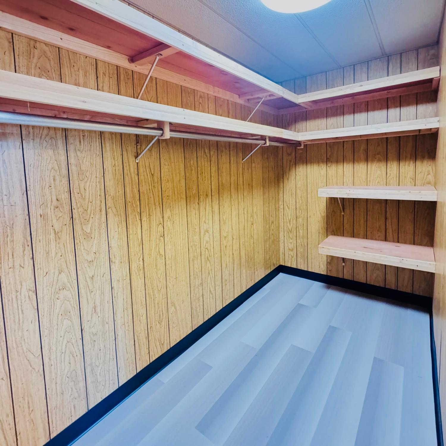 3901 West Lake Road, Unit 123 West Sacramento, CA 95691 - Photo 17 of 26 a view of a room with racks on the wall