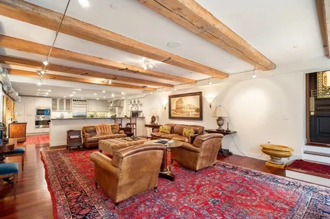 a bathroom with a sink vanity and a mirror