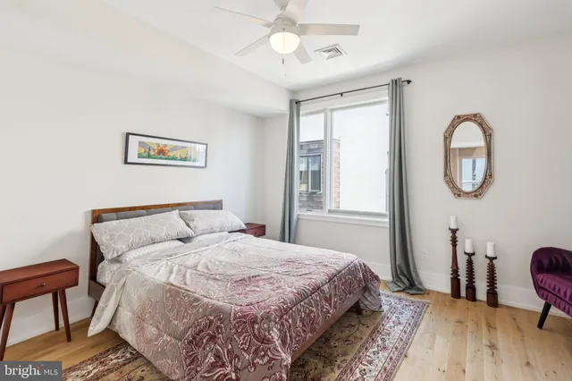 a kitchen with a sink and a refrigerator