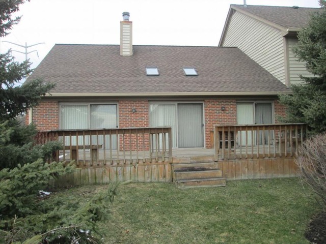 1855 Koehling Road Northbrook, IL 60062 - Photo 2 of 17 a backyard of a house with wooden floor