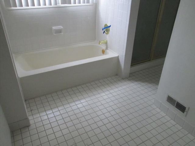 1855 Koehling Road Northbrook, IL 60062 - Photo 11 of 17 a bathroom with a bathtub
