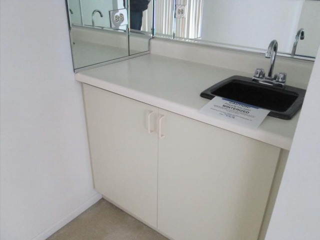1855 Koehling Road Northbrook, IL 60062 - Photo 13 of 17 a close view of a sink and dishwasher in a kitchen