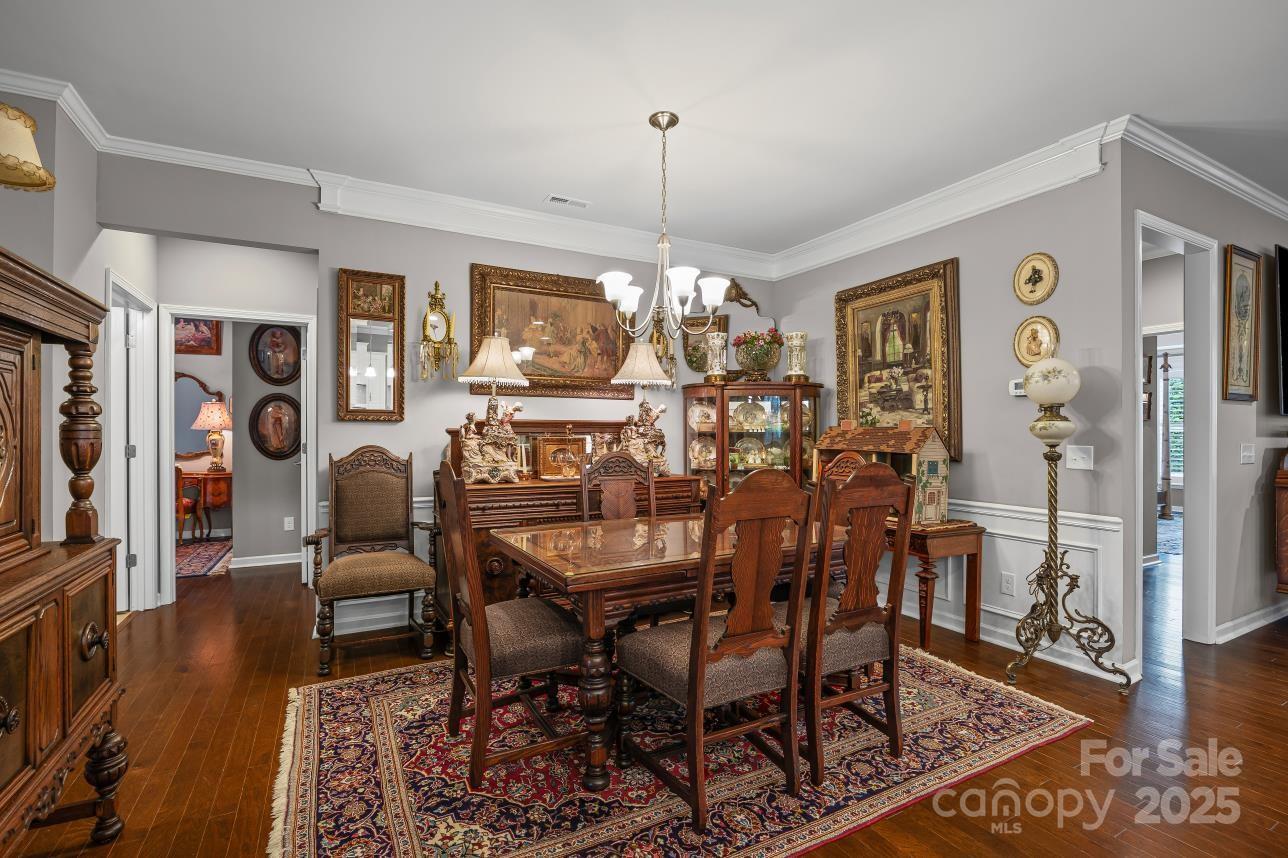 276 Grovefield Drive Fort Mill, SC 29715 - Photo 20 of 44 a view of a dining room with furniture window and wooden floor
