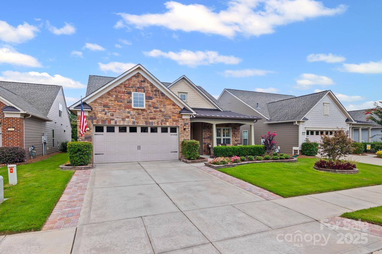 276 Grovefield Drive Fort Mill, SC 29715 - Photo 2 of 44 a front view of house with yard and green space