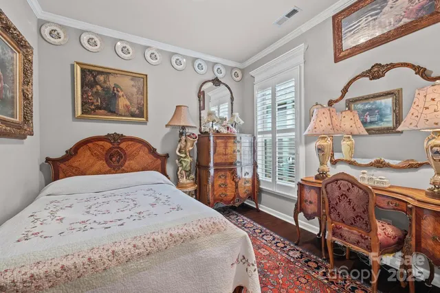 a bed room with a bed and a couch