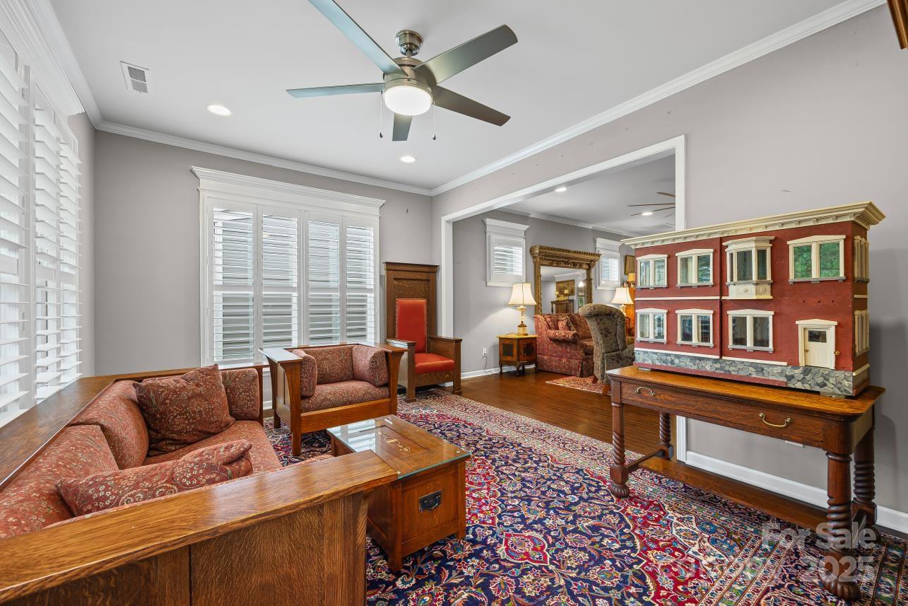 276 Grovefield Drive Fort Mill, SC 29715 - Photo 26 of 44 a living room with furniture a rug and a window
