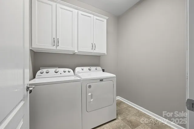 a bedroom with bed and a couch