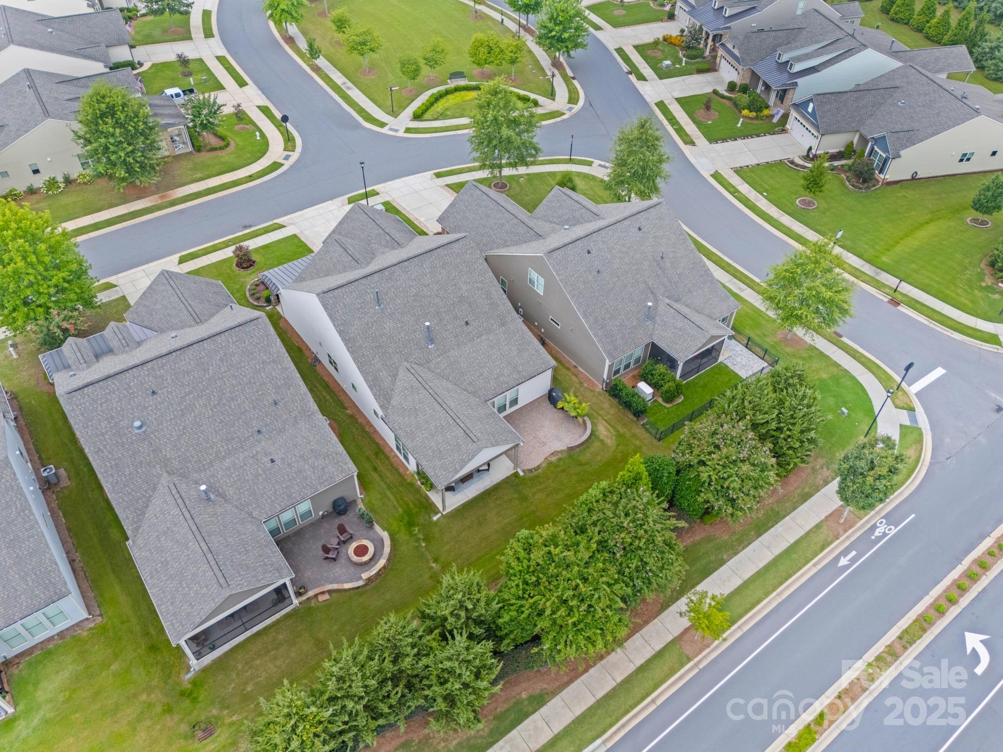 276 Grovefield Drive Fort Mill, SC 29715 - Photo 37 of 44 an aerial view of a house with a garden and a swimming pool