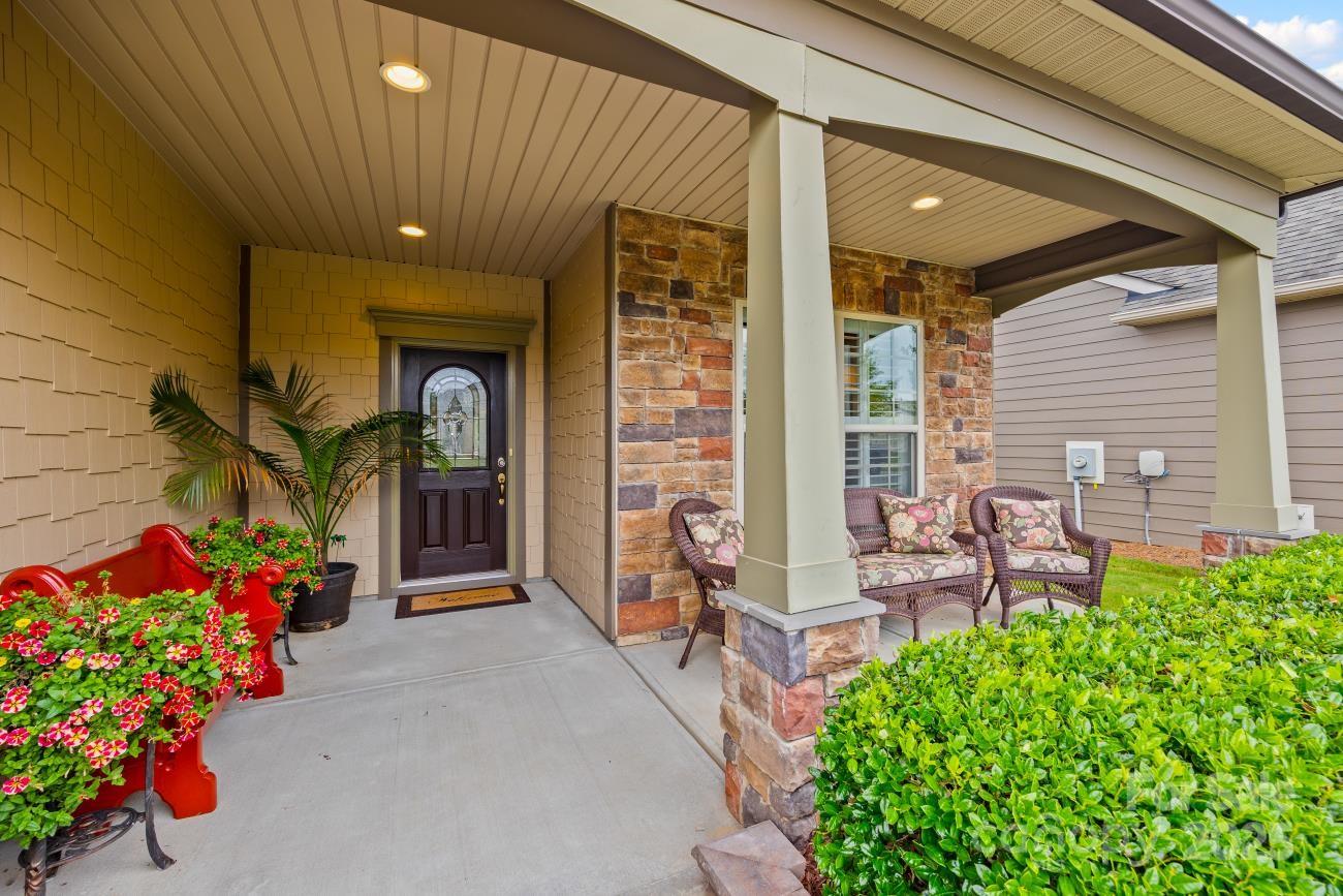 276 Grovefield Drive Fort Mill, SC 29715 - Photo 4 of 44 a front view of a house with an outdoor seating