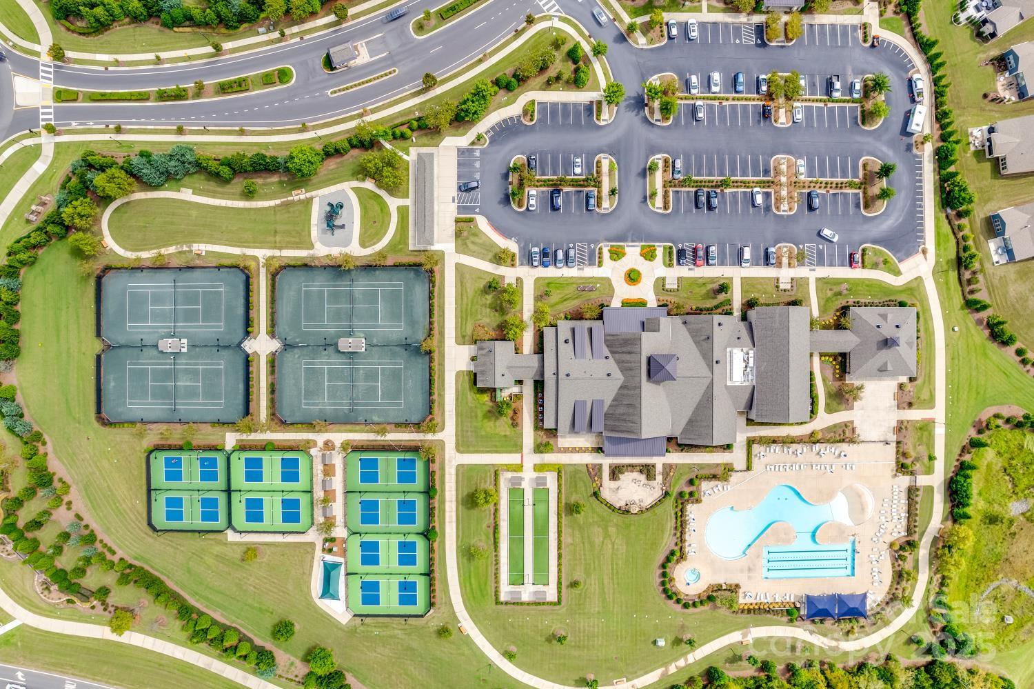 276 Grovefield Drive Fort Mill, SC 29715 - Photo 44 of 44 aerial view of a brick building with many windows