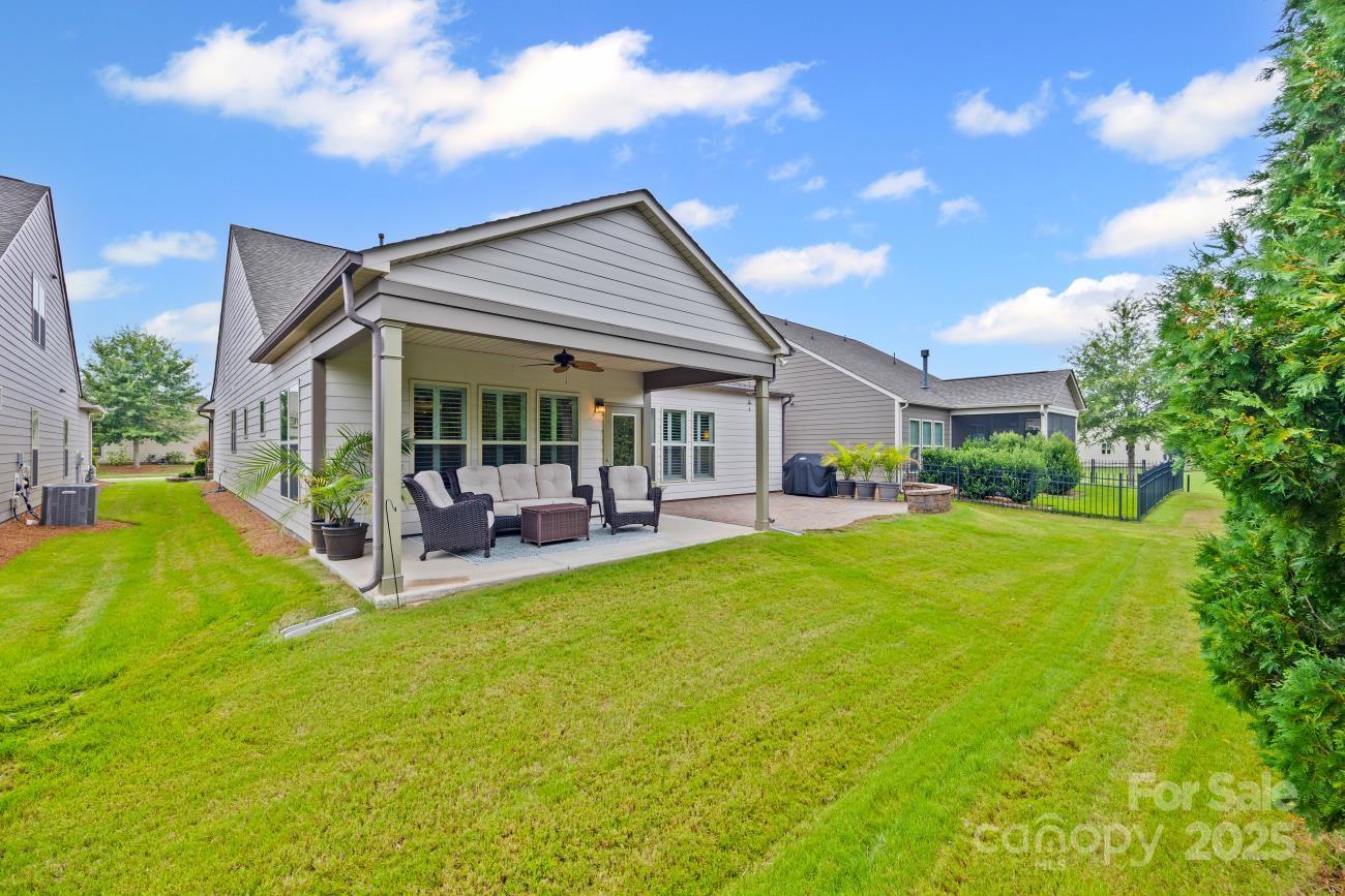 276 Grovefield Drive Fort Mill, SC 29715 - Photo 6 of 44 a view of house with backyard and patio
