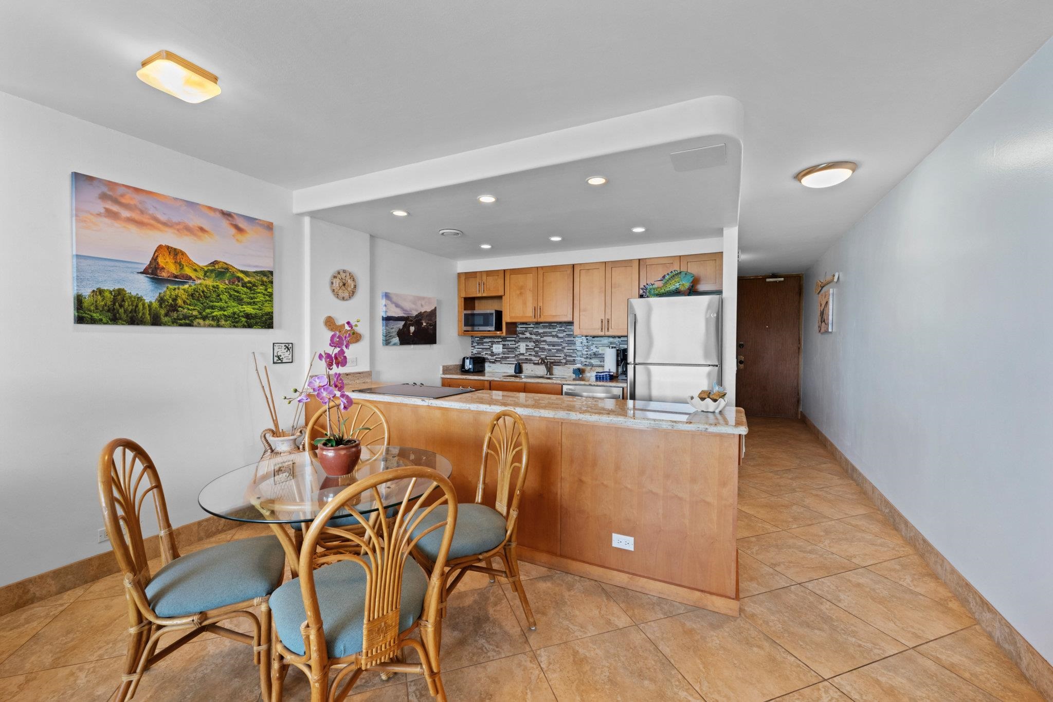 4471 Lower Honoapiilani Road, Unit 415 Lahaina, HI 96761 - Photo 14 of 44 a view of a dining room with furniture