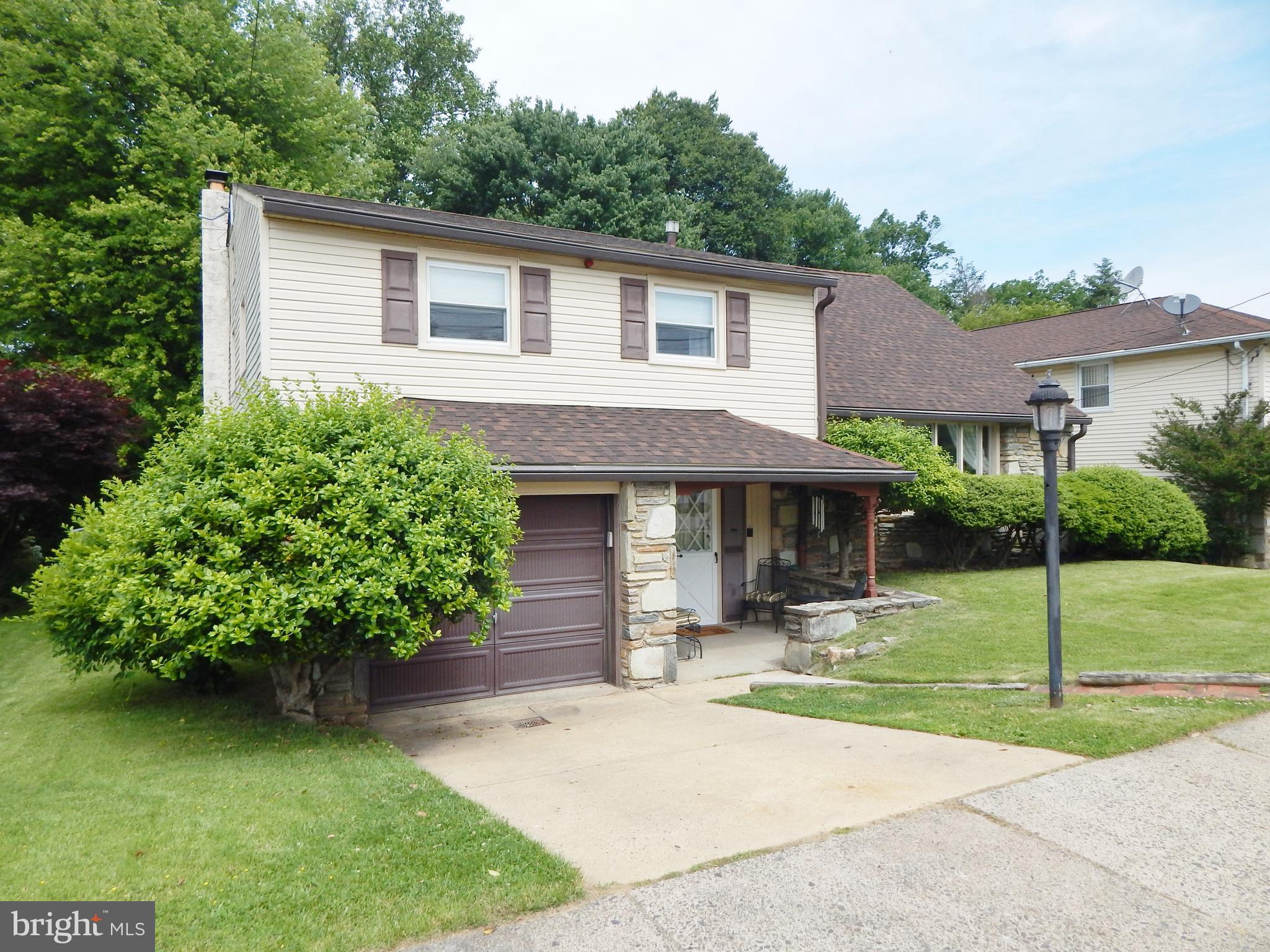 9716 Wynmill Road Philadelphia, PA 19115 - Photo 3 of 23 a backyard of a house with seating space