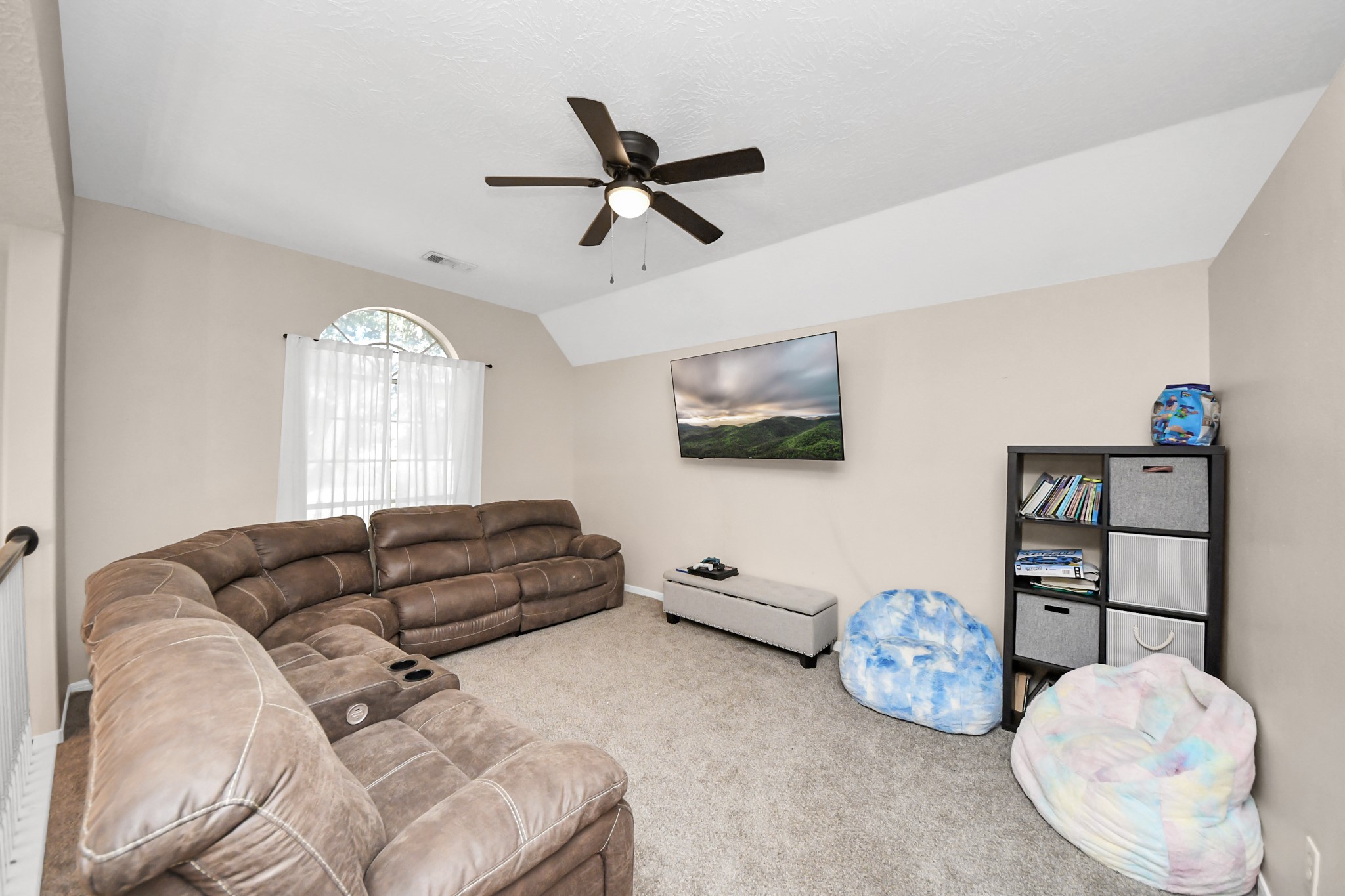 10514 Ravens Way Baytown, TX 77523 - Photo 16 of 50 Flexible open space upstairs that can be used as a game room, office, or additional living area.