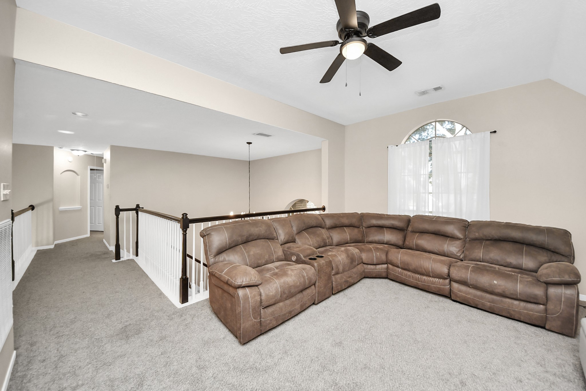 10514 Ravens Way Baytown, TX 77523 - Photo 17 of 50 Alternate view of the upstairs flexible space, showcasing its size, natural light, and versatility.